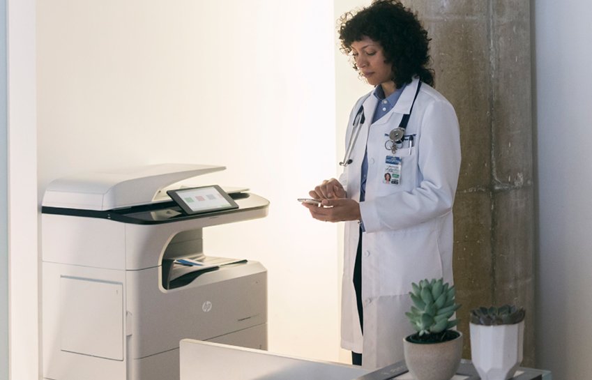 A doctor using Printer