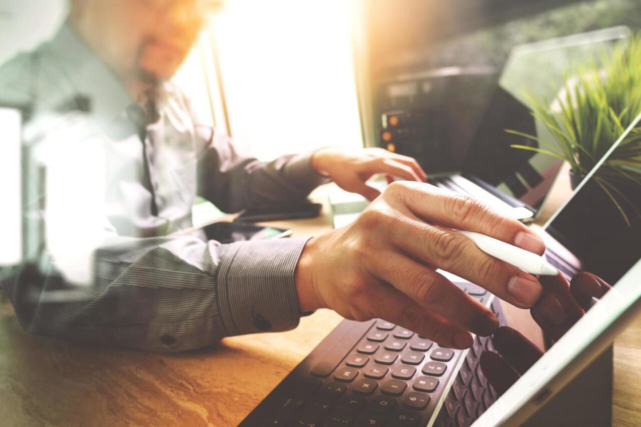 A person working on PC