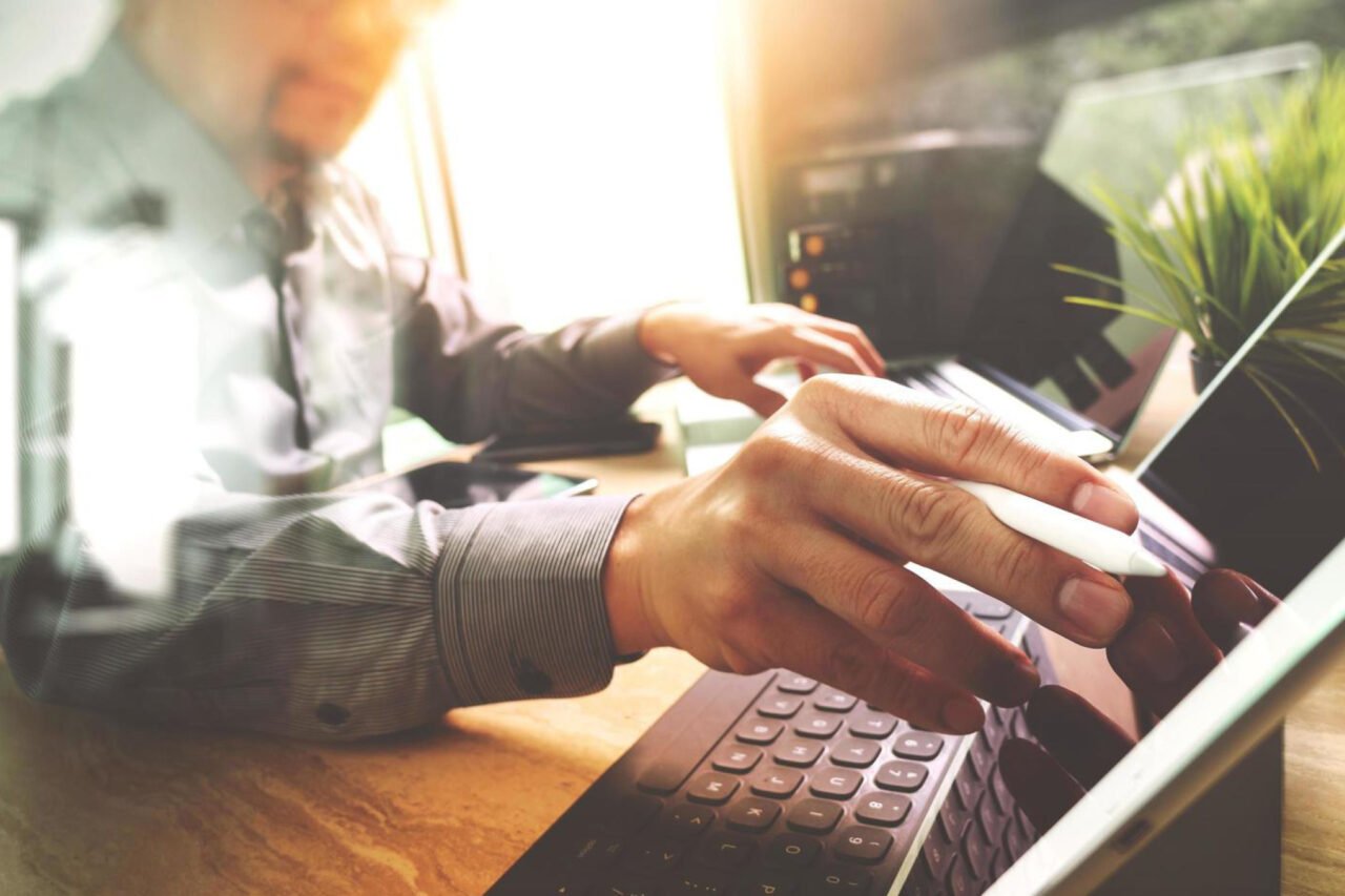 A person working on PC screen