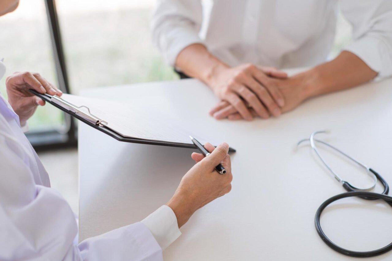 A doctor consulting Patient