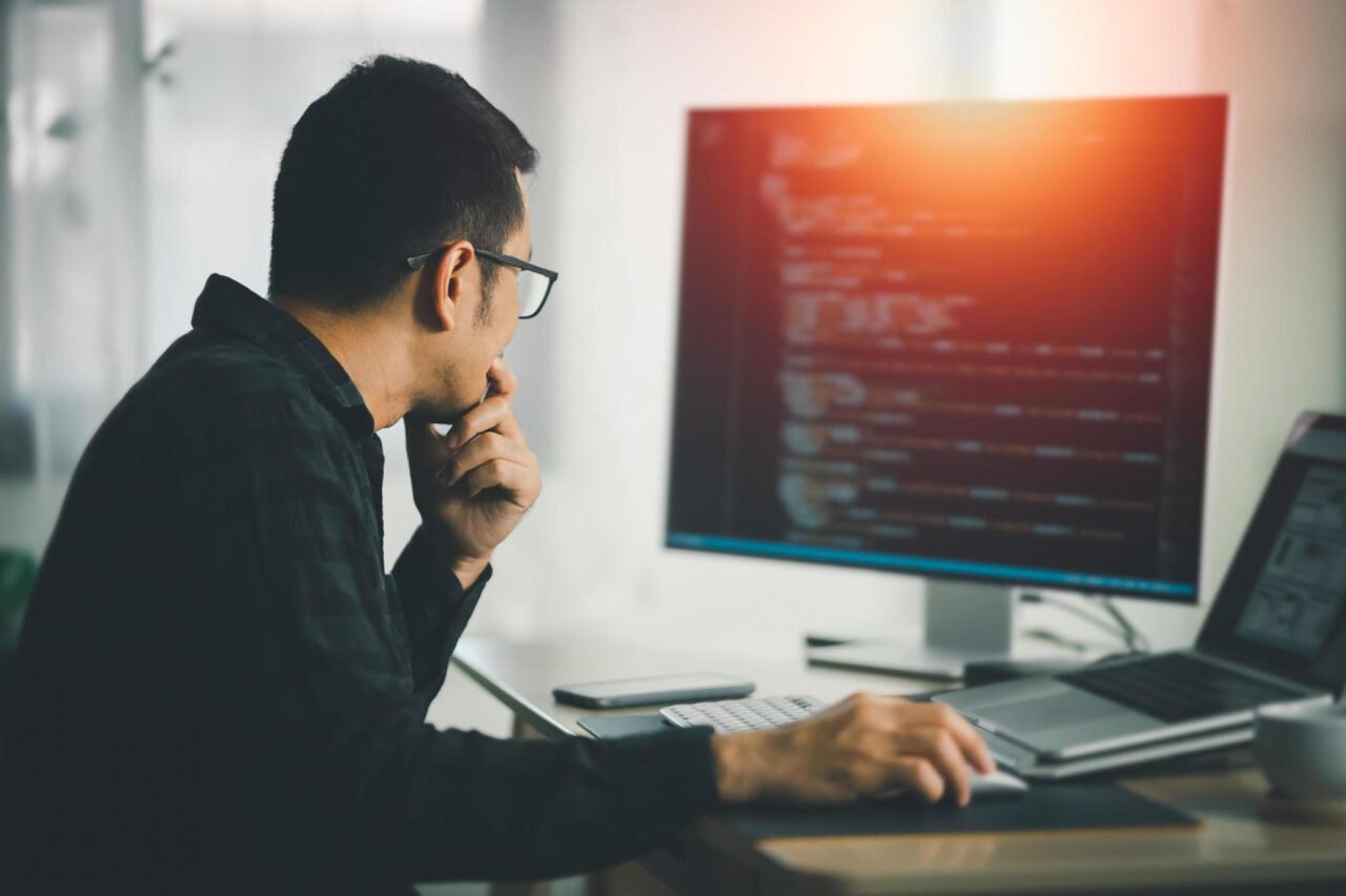 A person working on Computer