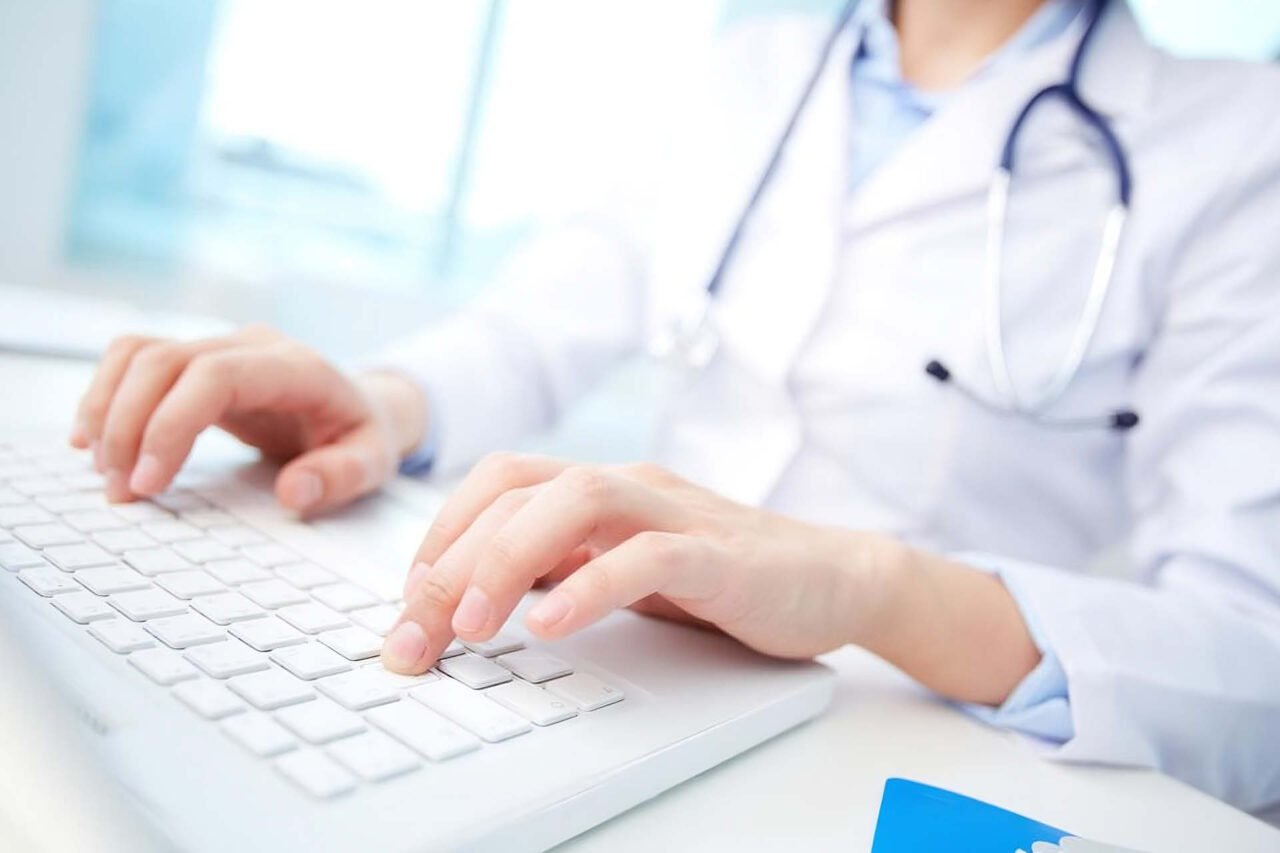 A doctor working on computer