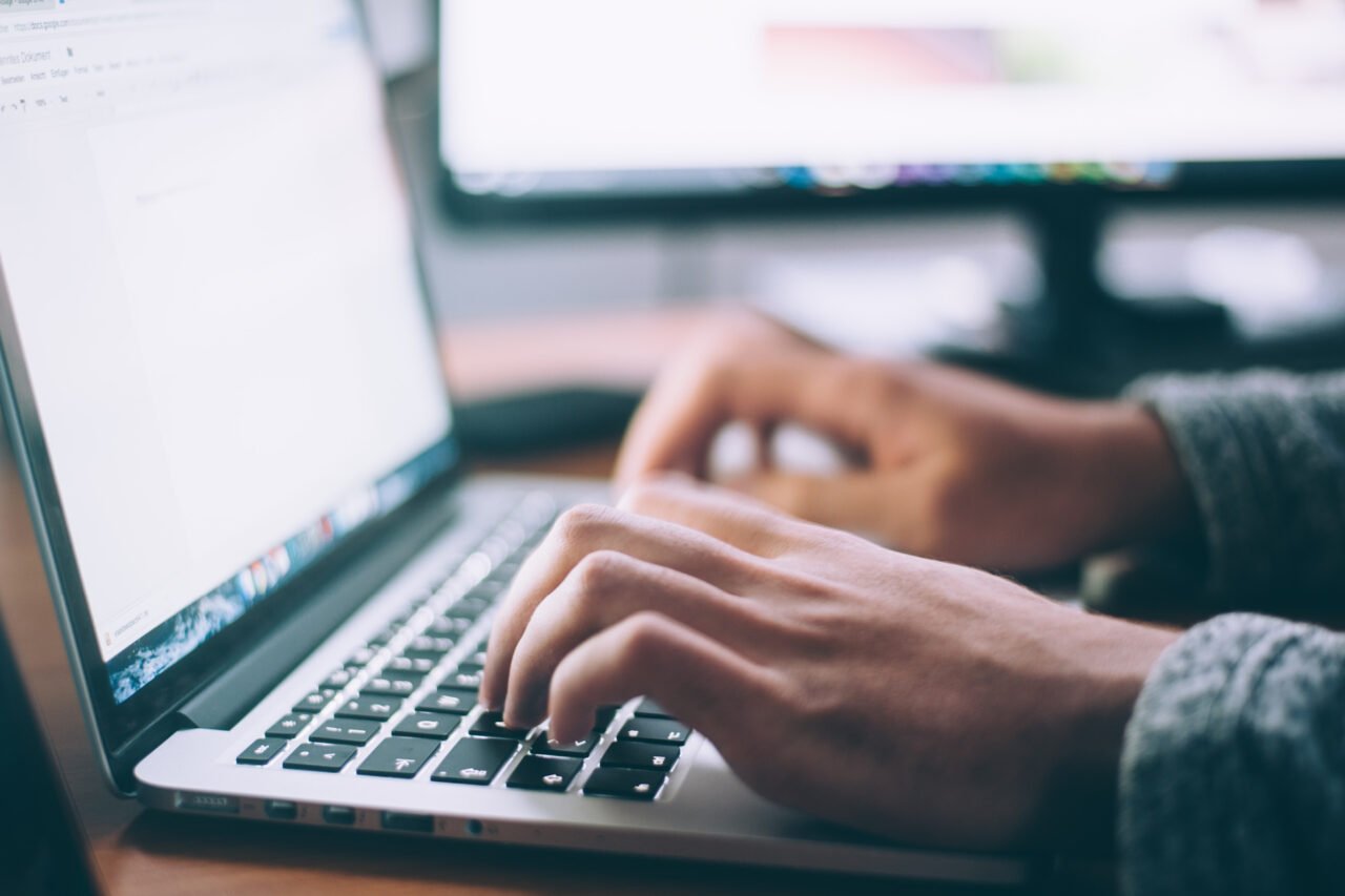 A person working on Laptop