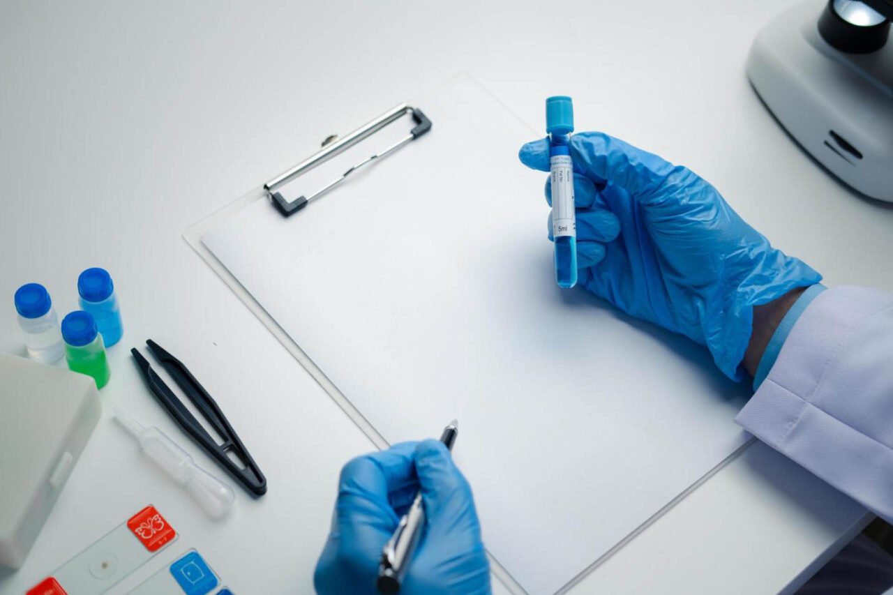 A medical laboratory scientist writing a report