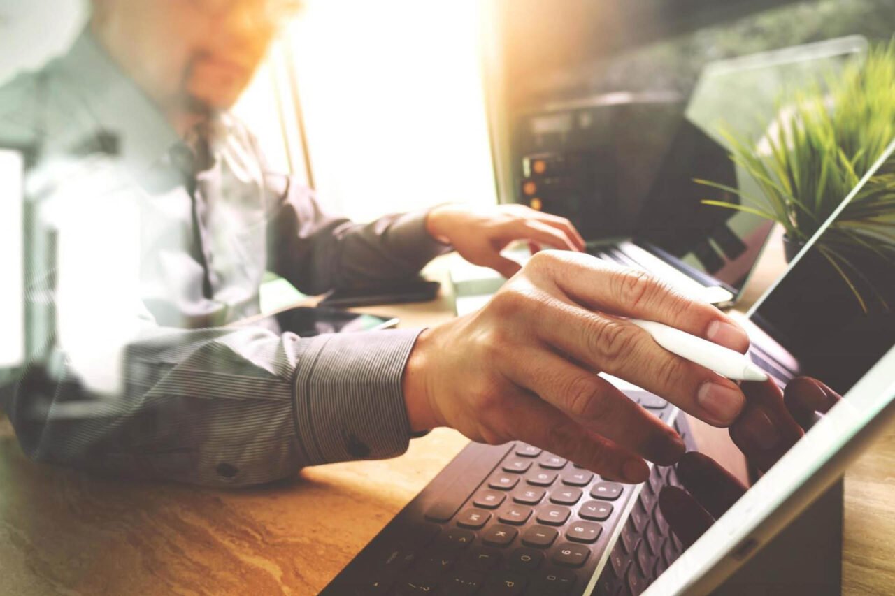 A person working on Laptop